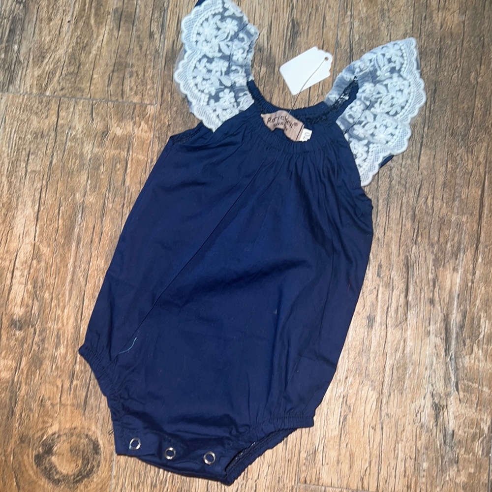 Baby girl onsie with lace sleeve